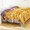 ブランケットボヘミアンスタイルの綿の重み冷却ソファブランケットベッドのベッドにベッドがあります