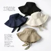 Verão primavera japão gravata balde chapéu feminino coreano grande borda pescador dobrável protetor solar chique algodão linho praia sol 240318
