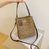 Sac Coachness de créateur Koujia 2024 Nouveau sac seau à eau à fleurs anciennes Sac à bandoulière imprimé pour femme Sac à bandoulière à la mode et polyvalent à une épaule