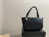 Enamelled metal triangle logo Magnetic closed leather Tote bag Shopping bag Medium size women's multi-colored handbag