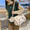 Axelväskor 2024 japanska söta damer rutiga messenger väska söt girly