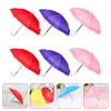 Guarda -chuvas 4 pcs mini -guarda -chuva propó crianças crianças decorativas minúsculas crianças plásticas