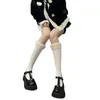 Kvinnliga strumpor japanska över kalv lång faux lamm ull päls trim lapptäcke ben varmare strumpor