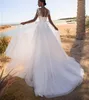 Eleganckie długie rękawowe szyi szyi koronkowe sukienki ślubne A-line biały tiul Sweet Train Garden Bridal Suknia Buttons