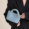 Le sac d'usine d'exportations à la main tissé à la main secoue de panier à la main pour les femmes 2024 Nouvelle chaîne d'épaule unique