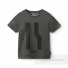 Moda na litera dla dzieci drukowana koszulka chłopcy dziewczęta okrągłe kołnierz krótkie rękawowe topy 2024 Summer dzieci bawełniane ubrania Z7330