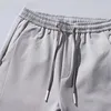 Mäns shorts Sommarsport Rak Löst typ manlig avslappnad fast färg Elastisk midja dragkammare joggingbyxor