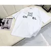 Bawełniana para mody designerka okrągłego szyi T -koszulka Casual Man Tees z dwoma literami graficznymi grafiką krótkie rękawy