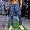 Akcesoria Pencil Pants Mens Gym swobodne spodnie dresowe Pisty łowić oddychanie szybkie lodowe jedwabne sportowe sportowe trening joggingowy