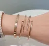 Pulseira de unhas branquear jóias jóias de luxo de luxo de moda diamante dourado prateado aço inoxidável puxador de nó