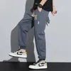 Pantaloni da uomo primavera tinta unita con coulisse in fibra di poliestere ricamo pantaloni casual pantaloni da jogging larghi High Street Harajuku pantaloni sportivi T4aH #