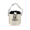 Sac de créateur Sac fourre-tout Style Punk Saturn West Empress Dowager Bucket Sac à main en cuir véritable Mini cordon de serrage Sac à bandoulière tendance