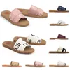 Designer tofflor Woody Sandals Cloe Fabric Canvas Letters Luxury Brand Slides Flat Sandals Bekväm trendig fashionabla öppet toed utomhushemsand tofflor