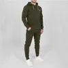 Varumärkesmän spårar tröjor passar män spår svettdräkt rockar man lyxiga designers jackor trycker hoodies byxor tröjor sportkläder