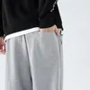 Haftowane elastyczne talia marki Mężczyzn dziewiąte spodnie 2022 jesień nowe gofrowe luźne legginsy swobodne spodnie chłopiec sportowy dres 4xl m3ng#
