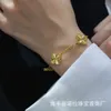 Бренд очаг мода Light Luxury и высококлассная ручной работы v Gold Edition Fantasy Four Leaf Grass Bracelet Laser Женщина