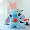 Partihandel anime tecknad film 40 cm plysch leksak stjärnkläder baby stitch dollmaskin par kudde bilmonterade tillbehör kreativa leksaker presentrum dekoration klo maskin priser