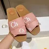 Designer Luxe Zomer Slippers Nieuwe EVA Letter Cross Weven Modieuze Romeinse Sandalen Vrouwen Kleurblok Vrije tijd Strand Toerisme Vakantie Slippers