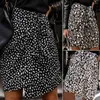 Jupes 2023 femmes jupe léopard imprimé haute taille tempérament A-line courte irrégulière pour la fête du club de fête