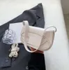 Sacs de créateurs épaule à la mode crossbody Underarm dingdang chaud vendeur niche petite fois à la mode et aux femmes texturées personnalisées