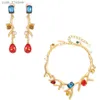 Boucles d'oreilles Collier Mode européenne et américaine couleur cristal corail Long gland boucles d'oreilles perle goutte oreille Clip oreille goujons collier ensemble L240323