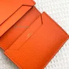 トップオリジナルレザーデザイナーカードホルダーファッショナブルパスポートカバー女性と男性用オレンジウォレットレディカードバッグ財布ケース2024