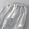 A03 Printemps Hommes Fi Pantalons Japon Style Haute Qualité Petit Patch Design Cordon Tricot Longueur Cheville Basique Pantalon de survêtement u8tw #