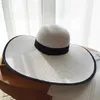 Szerokie brzegowe czapki wiadra czapki lato prosty miękki hat słoneczny szeroki brązowy kapelusz plażowy dziewczęta plażowe podróżowanie słomek krem ​​przeciwsłoneczny UV ochronne damskie kapelusz J240325