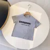 Designer tees barn mode t-shirts pojkar flickor sommar caual brev tryckt toppar baby barn t skjortor stiliga trendiga tshirts