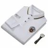 Neue Fi Herren Poloshirt Luxus bestickt Cott Revers Kragen Lg/kurze Ärmel koreanische Tops u4zC #
