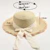 Szerokie brzegowe czapki wiadra czapki damskie letnia słomka czapka czarno -biała wstążka kokardka filta przeciwsłoneczne plażowe kapelusz damski na zewnątrz składany wakacyjny kapelusz słoneczny J240325