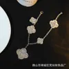 Merk charmus van klaver onregelmatige armband hoge versie platina platina volledige diamantgrootte bloem 925 zilver