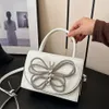 Tasarımcı lüks moda omuz çantaları moda el tipi küçük kare çanta 2024 yeni batı tarzı tek omuz crossbody kelebek kadın çantası