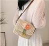 Drawstring 2024 Summer Böhmen Girls Handväskor mode Sweet Flower Straw Weave Axel Messenger Bag For Women Beach Party Small