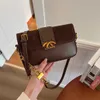 36% KORTING Designer tas 2024 Handtassen Hoge kwaliteit Franse Commuter Schouderketting voor Chinees Jaar Modieuze en veelzijdige Crossbody met enkele schouder