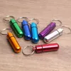 Mini Mini Aluminium Aluminy Pill Pill Box Carrtridge Keychain Outdoor مقاوم للماء محكم الأدوية