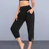 Pantaloni da donna Yoga ritagliati alla moda a vita alta con tasche tinta unita Sport per allenamento casual