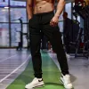 Akcesoria Pencil Pants Mens Gym swobodne spodnie dresowe Pisty łowić oddychanie szybkie lodowe jedwabne sportowe sportowe trening joggingowy