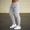 Мужские брюки Sik пробегают мужчины Fitness Joggers, работающие спортивные леггинсы