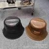 ワイドブリム帽子バケットデザイナーハット女性秋と冬の韓国版汎用フェイスショースモールネットレッドソリッドカラーシンプルレザーフィッシャーマンスプリング3B4Q