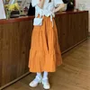 Kjolar vår sommar veckade orange söt tårta kjol för kvinnor koreansk mode elastisk hög midja a-line enkel lös kawaii