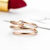 Goldring Luxus Liebesnagelring Luxusschmuck Titanstahl Doppelt Mode Straße Lässig Paar Klassisch Gold und Silber Rose Hochzeit Party Geschenk