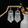 Boucles d'oreilles Miao en argent imitation, boucles d'oreilles pour attraction touristique des minorités ethniques, boucles d'oreilles bohème à longues feuilles pour collection de cadeaux