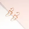 Baumelnde Ohrringe 585 Lila Gold U-förmige Schraubohrstecker Kreative vergoldete 14K Rose Design Kette Quaste für Frauen Bankettschmuck