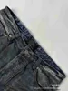Designer de alta versão B família 23SS outonoinverno casual e versátil Instagram homens e mulheres lavadas e desgastadas calças de reparo de máquina desgastadas jeans DCGE