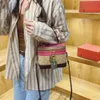 Magasin de gros sacs de créateurs sac à bandoulière à la mode petit rond avec sac à main patchwork de couleur contrastée pour 2024 femmes polyvalentes et élégantes