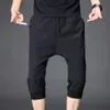 Pantaloni corti Tipo sciolto Quick Dry Coulisse Vita elastica alla caviglia Pantaloni corti Pantaloni sportivi da uomo Anti-pilling