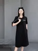 Designerfashion Polo Kołnierz plus sukienka dla kobiet Nowy letni krótki rękaw średniej długości blok kratowy