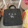 Varumärkeshelgen Totes väskor Luxury Beach Bag Designer Stor vävd Tote Hollow Out Knitting Shopping Handväska stickad kvinna Luxurys handväskor Womens 2024