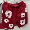 Shorts masculinos Designer de homens Floral Graphic Harajuku Mulher de grande tamanho casual Streetwear Fashion Letter Loose Pants Short L6